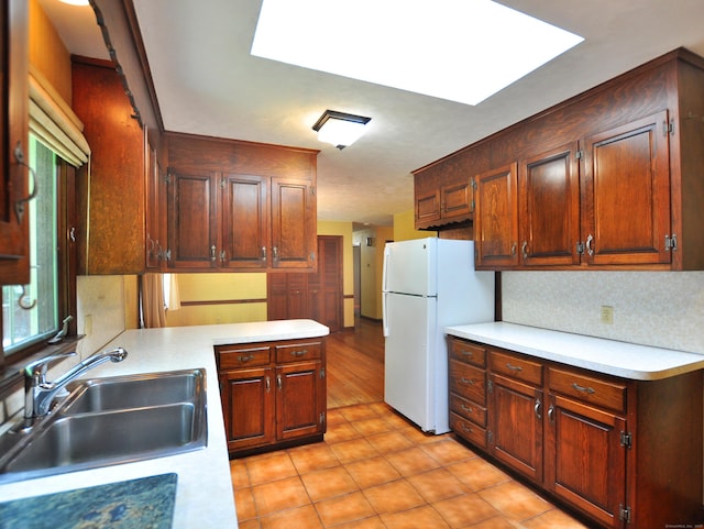 3 Carriage Dr, Canton, CT 06019 - kitchen with freestanding refrigerator, light countertops, and decorative backsplash