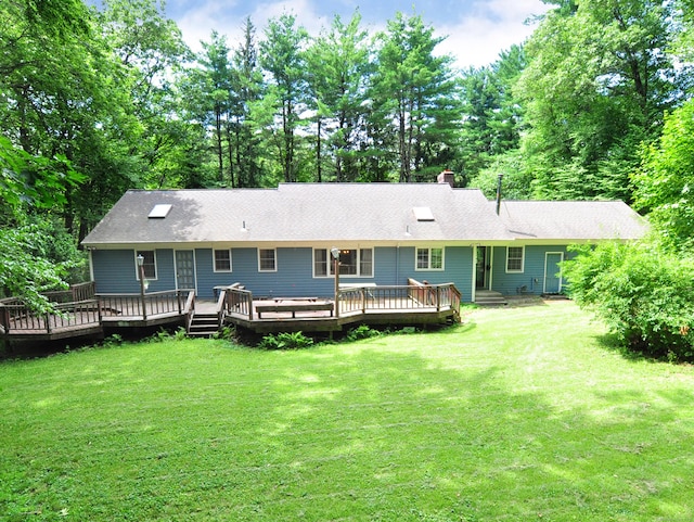 3 Carriage Dr, Canton, CT 06019 - back of property with a lawn, a wooden deck, a chimney, and view of scattered trees