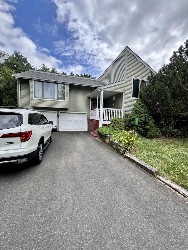 70 Regency Dr, Windsor, CT 06095 - view of front of house with driveway and covered porch