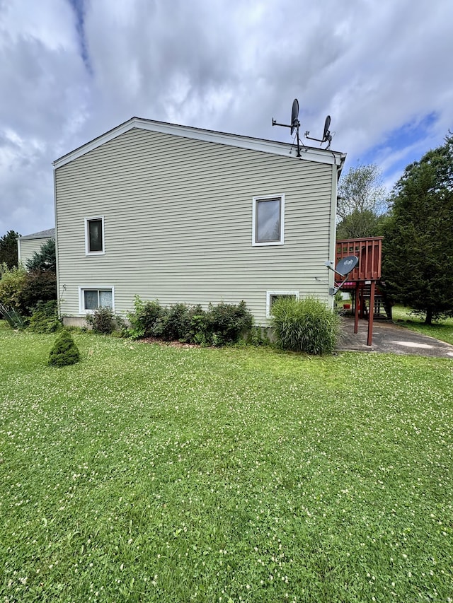 70 Regency Dr, Windsor, CT 06095 - view of property exterior with a yard and a deck