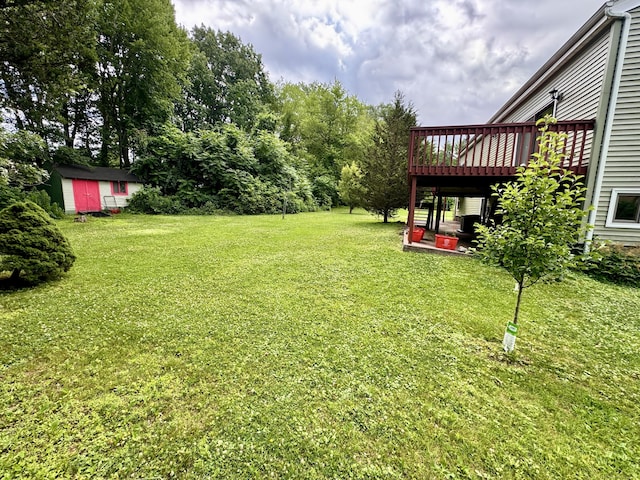 70 Regency Dr, Windsor, CT 06095 - view of grassy yard with a deck and a shed