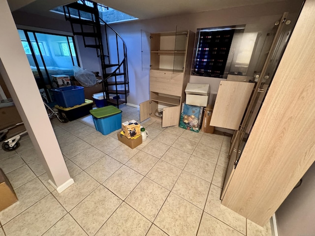 70 Regency Dr, Windsor, CT 06095 - below grade area featuring tile patterned flooring and stairs