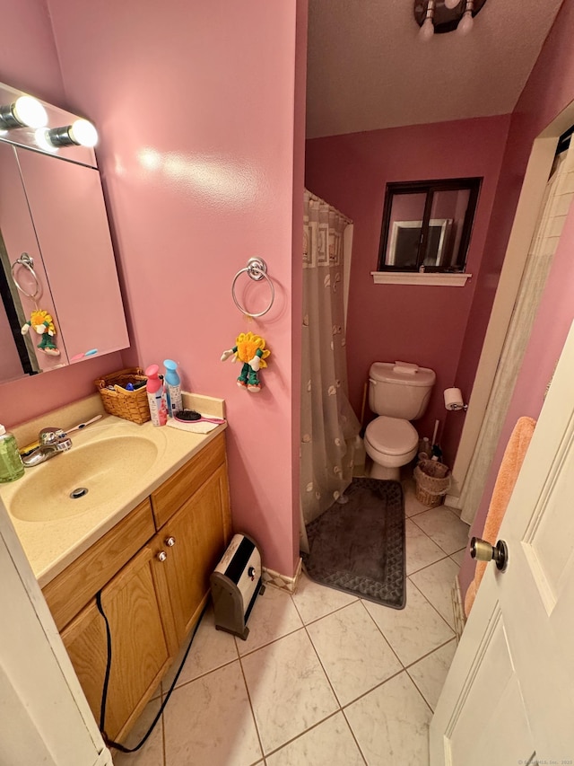 70 Regency Dr, Windsor, CT 06095 - bathroom with vanity, tile patterned floors, and curtained shower