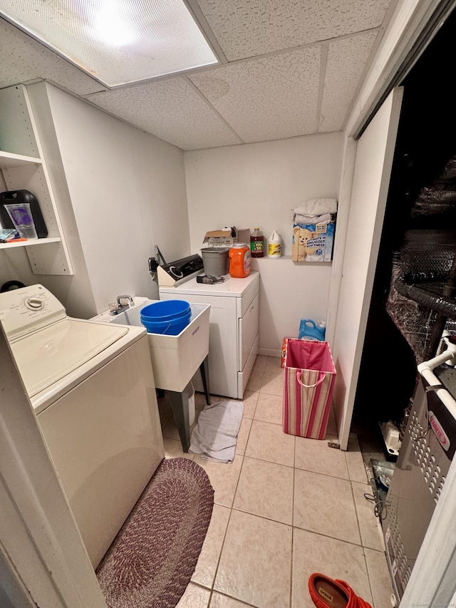70 Regency Dr, Windsor, CT 06095 - washroom featuring independent washer and dryer and light tile patterned flooring