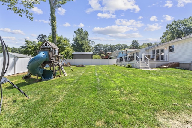 24 Pine Tree Rdg, Meriden, CT 06450 - fenced backyard featuring a playground and a wooden deck