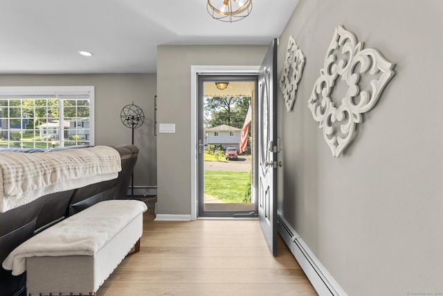 24 Pine Tree Rdg, Meriden, CT 06450 - entryway featuring wood finished floors, a baseboard radiator, and recessed lighting