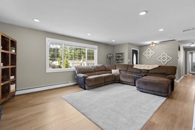24 Pine Tree Rdg, Meriden, CT 06450 - living room featuring a baseboard radiator, wood finished floors, and recessed lighting