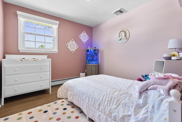 24 Pine Tree Rdg, Meriden, CT 06450 - bedroom featuring a baseboard radiator and wood finished floors
