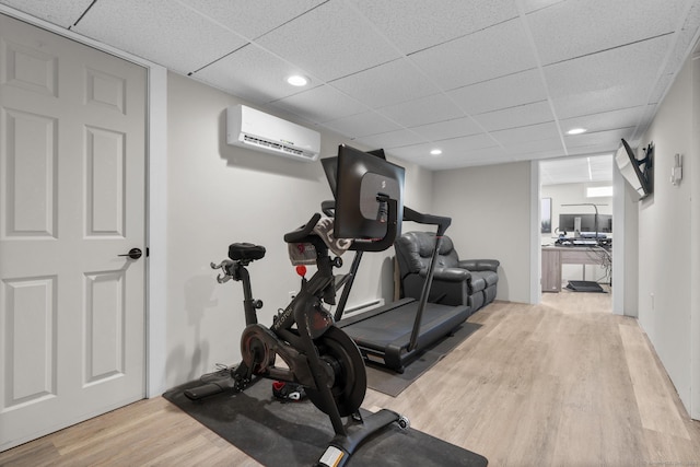 24 Pine Tree Rdg, Meriden, CT 06450 - exercise room featuring a wall unit AC, wood finished floors, a drop ceiling, and recessed lighting