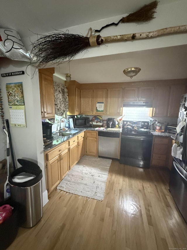72 School St, Norwich, CT 06360 - kitchen featuring black microwave, range, dishwasher, light wood finished floors, and light brown cabinets