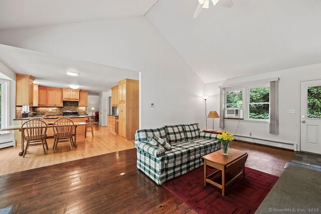 267 Jagger Ln, Hebron, CT 06248 - living area with baseboard heating, light wood finished floors, cooling unit, high vaulted ceiling, and ceiling fan