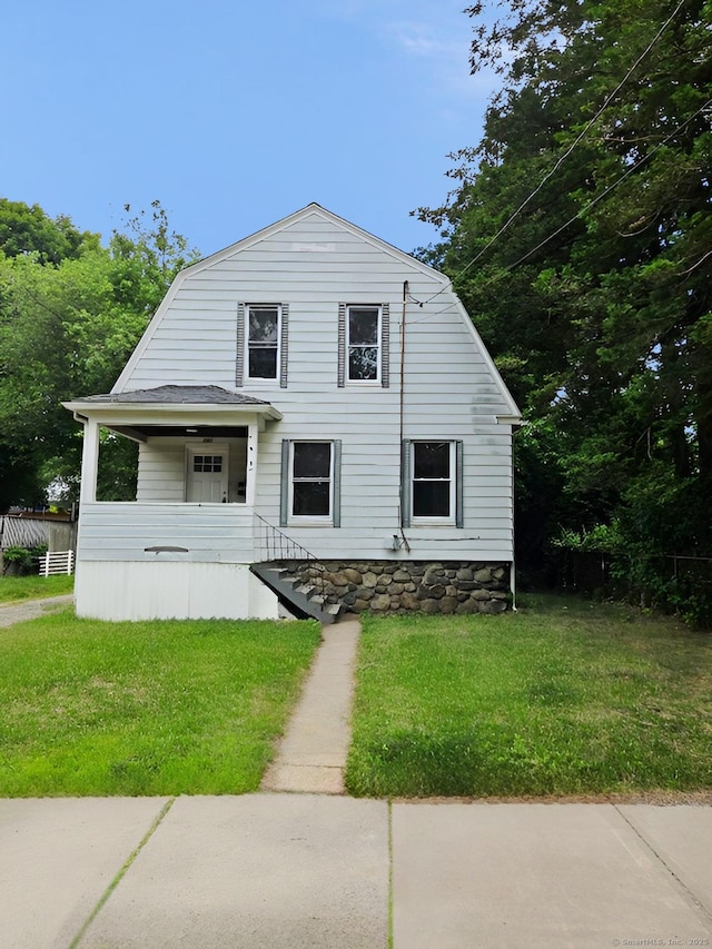 181 Plank Rd, Waterbury, CT 06705 - colonial inspired home with a gambrel roof and a front lawn