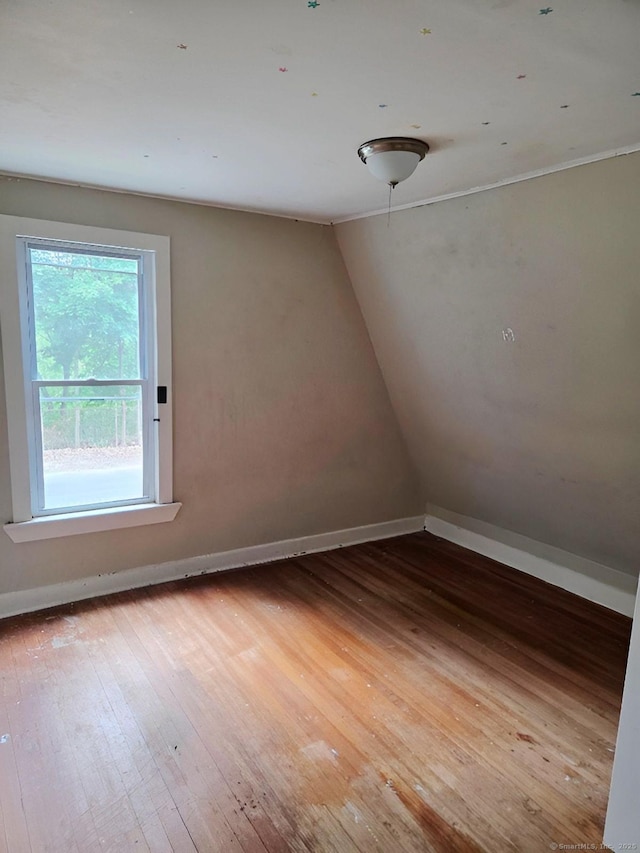 181 Plank Rd, Waterbury, CT 06705 - spare room featuring hardwood / wood-style flooring and lofted ceiling