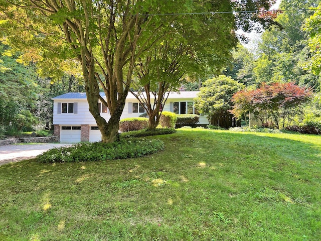 11 Mount Nebo Rd, Newtown, CT 06470 - view of front of home featuring an attached garage, driveway, a front yard, and brick siding