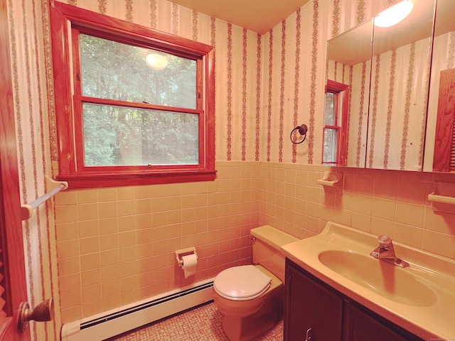 11 Mount Nebo Rd, Newtown, CT 06470 - half bath featuring a baseboard heating unit, wallpapered walls, wainscoting, vanity, and plenty of natural light