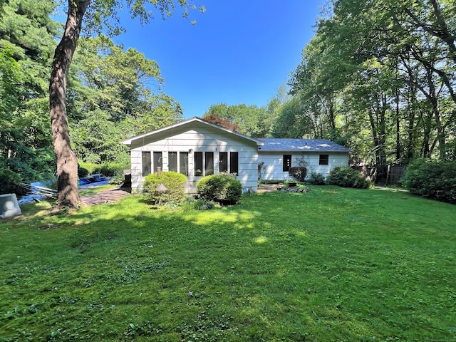 11 Mount Nebo Rd, Newtown, CT 06470 - rear view of property featuring a lawn
