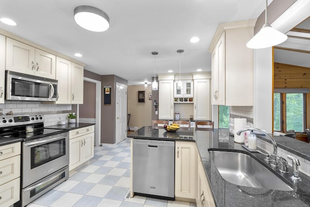 19 Buttercup Ln, Shelton, CT 06484 - kitchen with stainless steel appliances, light flooring, recessed lighting, pendant lighting, and tasteful backsplash