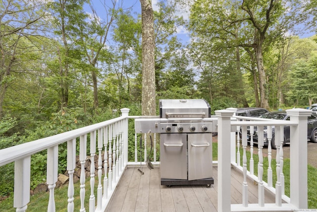 19 Buttercup Ln, Shelton, CT 06484 - wooden terrace with area for grilling and view of scattered trees