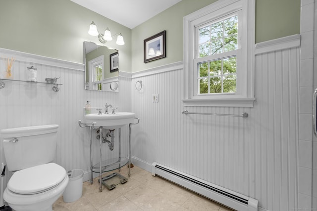 19 Buttercup Ln, Shelton, CT 06484 - bathroom with a baseboard radiator and a wainscoted wall