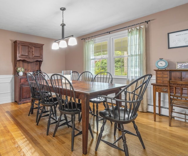 19 Buttercup Ln, Shelton, CT 06484 - dining area with light wood-type flooring and a wainscoted wall
