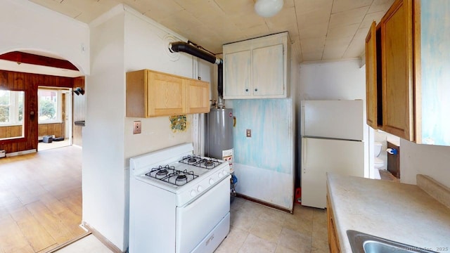 36 Merwin Ave, Milford, CT 06460 - kitchen featuring white appliances, light countertops, and water heater
