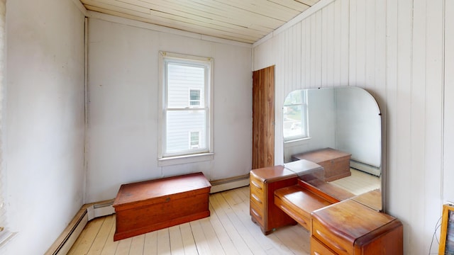 36 Merwin Ave, Milford, CT 06460 - sitting room with a baseboard heating unit, wooden ceiling, and light wood finished floors