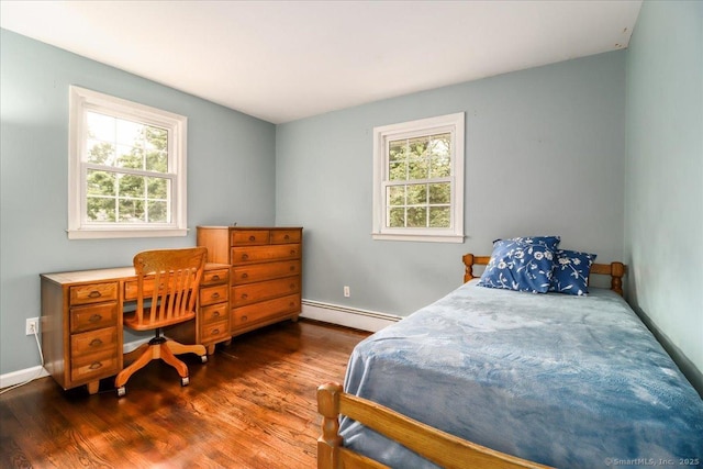 17 Robinhood Rd, Danbury, CT 06811 - bedroom featuring a baseboard heating unit and wood finished floors