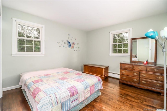 17 Robinhood Rd, Danbury, CT 06811 - bedroom featuring a baseboard heating unit, multiple windows, and wood finished floors