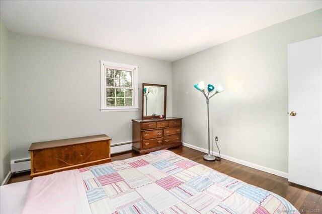 17 Robinhood Rd, Danbury, CT 06811 - bedroom featuring baseboard heating and dark wood finished floors