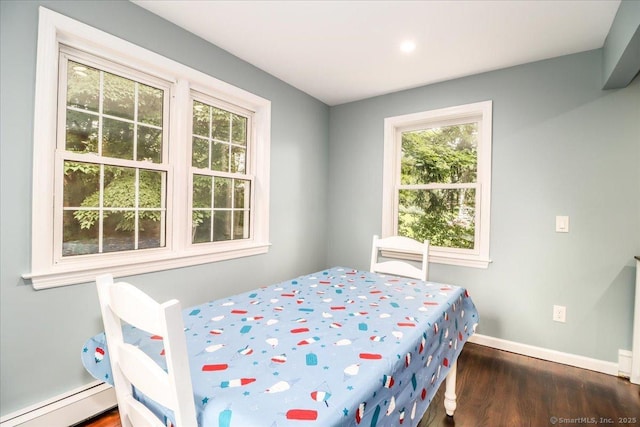 17 Robinhood Rd, Danbury, CT 06811 - bedroom with a baseboard heating unit, wood finished floors, and recessed lighting