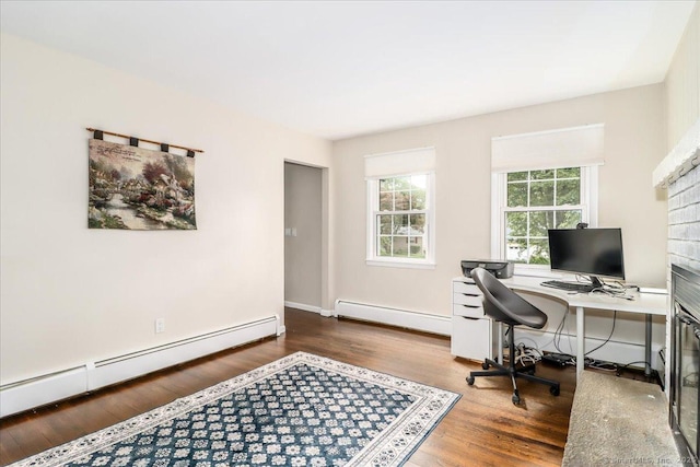 17 Robinhood Rd, Danbury, CT 06811 - office area featuring a baseboard radiator, wood finished floors, and a fireplace