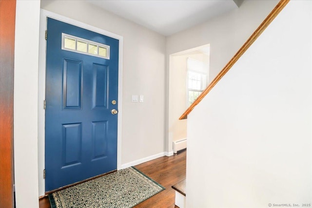 17 Robinhood Rd, Danbury, CT 06811 - foyer entrance with baseboard heating and dark wood-type flooring