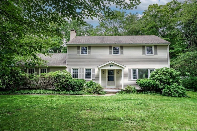17 Robinhood Rd, Danbury, CT 06811 - colonial home featuring a chimney and a front yard