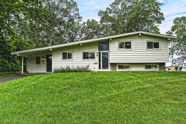 23 Briarwood Dr, Old Saybrook, CT 06475 - view of front facade featuring a front yard, a carport, and driveway