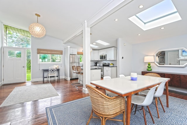 23 Briarwood Dr, Old Saybrook, CT 06475 - dining room with a skylight, lofted ceiling, dark wood finished floors, and recessed lighting