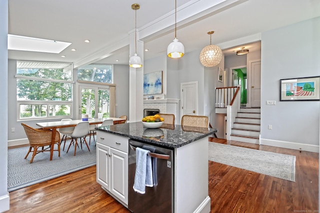 23 Briarwood Dr, Old Saybrook, CT 06475 - kitchen featuring stainless steel dishwasher, wood finished floors, a kitchen island, white cabinets, and recessed lighting