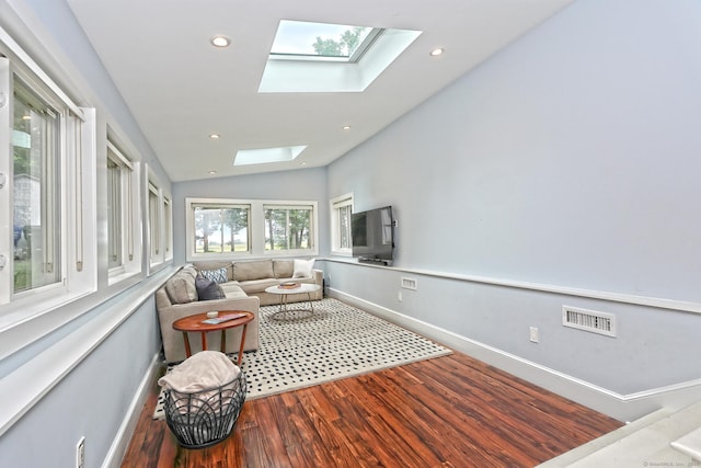 23 Briarwood Dr, Old Saybrook, CT 06475 - living room featuring a skylight, wood finished floors, vaulted ceiling, and recessed lighting