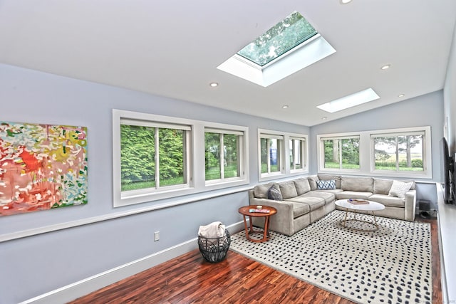 23 Briarwood Dr, Old Saybrook, CT 06475 - living room with a skylight, wood finished floors, vaulted ceiling, and recessed lighting