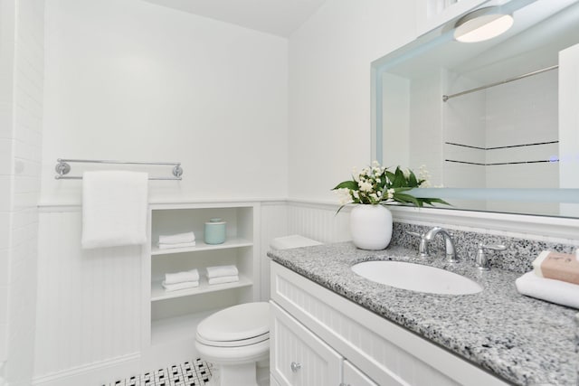 36 Hendrie Ave, Greenwich, CT 06878 - full bathroom featuring vanity, a wainscoted wall, and a shower