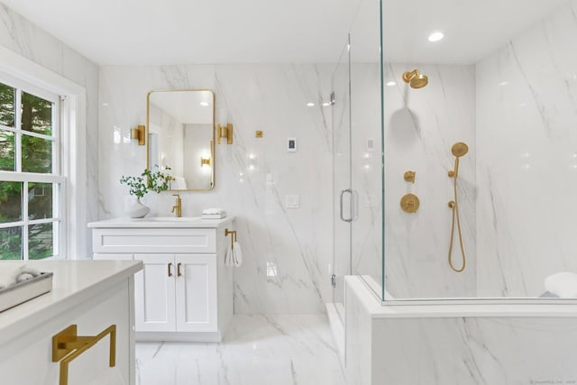 36 Hendrie Ave, Greenwich, CT 06878 - full bathroom featuring marble tiled flooring, vanity, and a marble finish shower