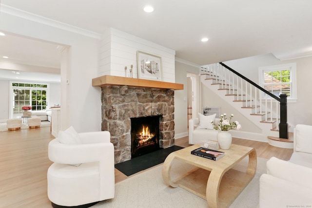 36 Hendrie Ave, Greenwich, CT 06878 - living room with wood finished floors, plenty of natural light, stairs, a fireplace, and recessed lighting
