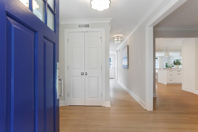 36 Hendrie Ave, Greenwich, CT 06878 - entrance foyer with light wood finished floors and ornamental molding