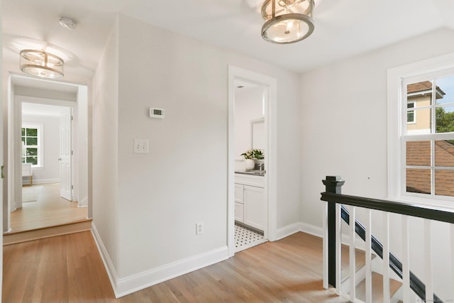 36 Hendrie Ave, Greenwich, CT 06878 - hall with an upstairs landing and light wood-style floors