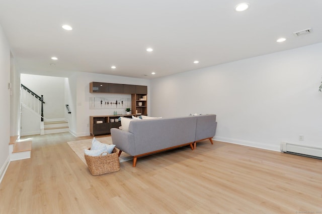 36 Hendrie Ave, Greenwich, CT 06878 - living room featuring light wood-style floors, stairway, baseboard heating, bar, and recessed lighting