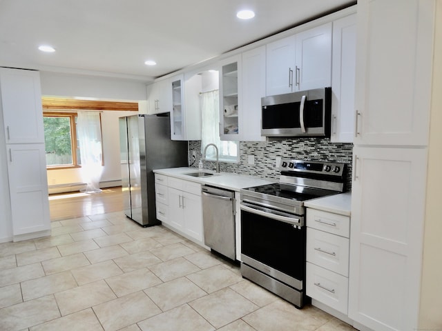 23 Norfolk Rd, Torrington, CT 06790 - kitchen with appliances with stainless steel finishes, backsplash, light countertops, white cabinetry, and recessed lighting