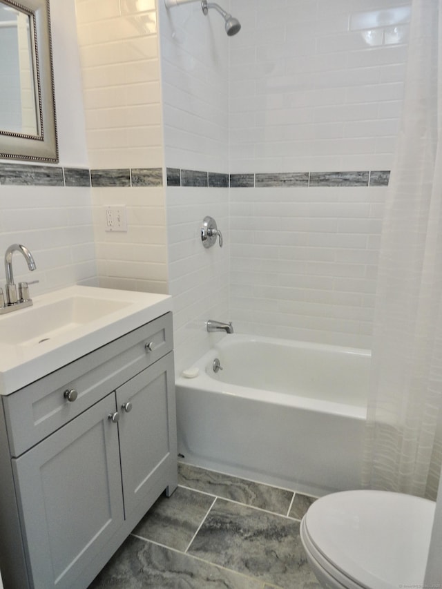 23 Norfolk Rd, Torrington, CT 06790 - bathroom featuring shower / tub combo, vanity, and tile walls