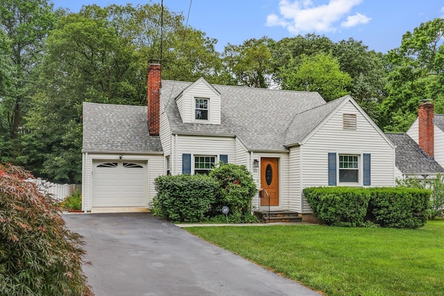 22 Brundage St, Stamford, CT 06907 - new england style home with driveway, an attached garage, a front yard, and a chimney
