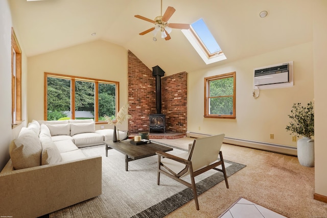 22 Brundage St, Stamford, CT 06907 - living area with a wood stove, a wall unit AC, a skylight, a ceiling fan, and lofted ceiling
