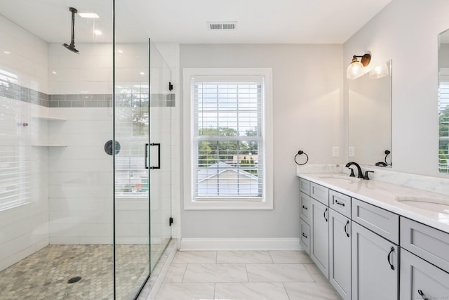 15 Wondy Way, Danbury, CT 06811 - bathroom featuring double vanity, a stall shower, healthy amount of natural light, and marble finish floors