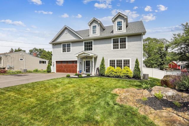 15 Wondy Way, Danbury, CT 06811 - view of front of home featuring a garage, asphalt driveway, and a shingled roof